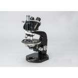 A Nikon Trinocular Microscope, serial no. 75922, black, four objectives, Nippon Kogaku Tokyo logo,