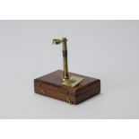 An early 19th Century lacquered brass Simple Pocket Field Microscope, in fitted mahogany case,