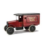 A professionally-restored or rebuilt Triangtois Wooden Daily Mail Ford Van, painted red and black,