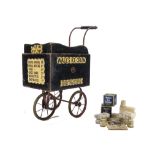 A Triangtois Wooden Wall's Ice Cream Cart 1920s, painted dark blue with red lining, paper labels