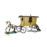 A large G & J Lines Wooden Horse-Drawn Gypsy Caravan, repainted yellow with green and yellow detail,