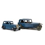 A Tri-ang Toys tinplate Saloon Car, painted blue with black mudguards, lithographed tyres and driver