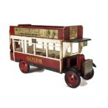 A Triangtois large Wooden General Omnibus No 1, painted red and white with paper advertising for