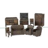 Pit-a-Pat Dolls' House Furniture, oil-cloth three piece suite, the sofa with oval label, two oil-
