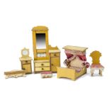 A German blonde wood Dolls' House Bedroom Set, comprising half-tester bed with pink curtains and