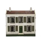 A Tri-ang Wooden Dolls' House 1920s, rough-cast with central green front door with lion head knocker