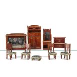 A German Art Nouveau Dolls' House Set, red stained with gold transfer decoration comprising sofa,