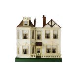 A G & J Lines No 33 Dolls' House circa 1909, cream-painted with central front door and canopy above,