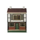 A Triangtois Size C Dolls' House circa 1924, with Timbered and rough-cast sides and top half façade,