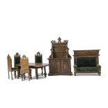 A larger scale German oak Dolls' House Furniture Set, buffet --9¼in. (23.5cm.) high, dining table,