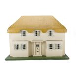 A Tri-ang No 1 Princess Dolls' House, modelled on the cottage 'Y Bwythyn Bach' built in Windsor