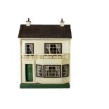 A G & J Lines No 60 Dolls' House 1915-17, repainted cream, green front door to the left with lion