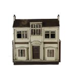 A G & J Lines Dolls' House, cream-painted with gold lining, central brown front door with lion