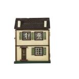 A small Tri-ang 1930s Dolls' House, with cream-painted façade, plain wood front door, tinplate