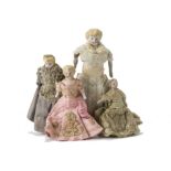 Four bisque shoulder-head Dolls' House Dolls, all with blonde hair and bisque limbs, one dressed