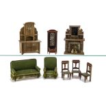 German Dolls' House Furniture, an oak fireplace with mirrored overmantel, printed paper tiles and