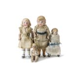 Three all-bisque Dolls' House Children, one with blonde moulded curls, blue painted shoes and