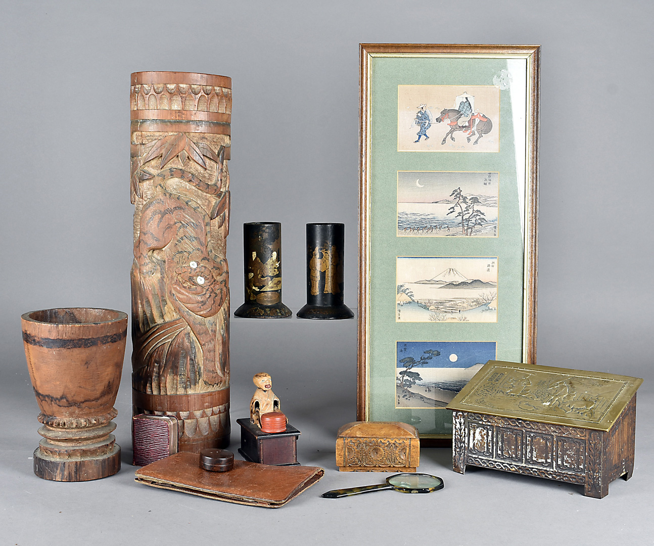 A Japanese bamboo sleeve vase, having engraved tiger design, together with a pair of papier mache