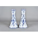 A pair of early 20th century Dutch Delft pottery vases, each hand painted with vignette of river