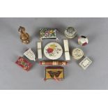 A collection of 19th Century needle cases and pin cushions, comprising three bone cased pin