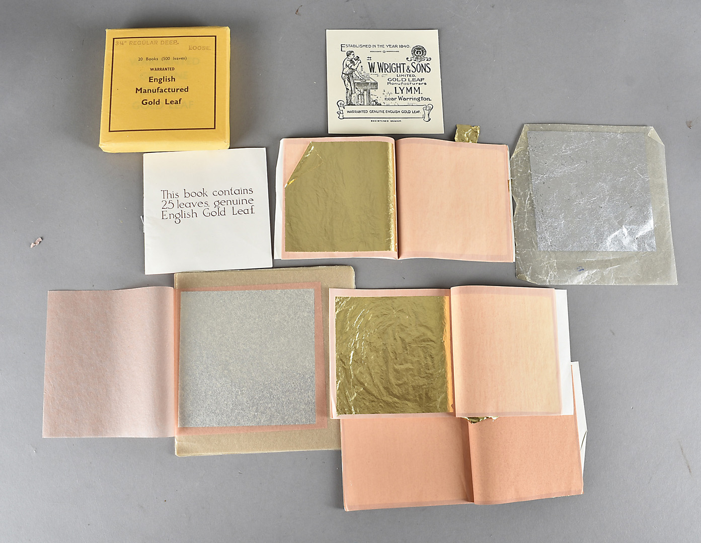 An assortment of gold and silver leaf, unused, (qty)