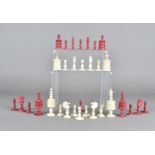 A 19th Century Anglo-Indian bone turned chess set, in red and natural (32)