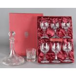 A set of crystal cut drinking glasses, together with a selection of other glassware items and