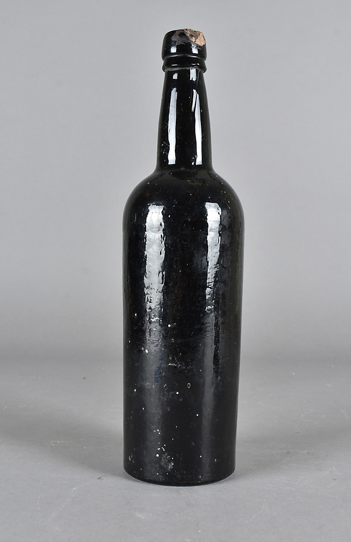 A vintage bottle of alcohol, stamped 1912 to the cork, possibly port, in brown glass bottle, 31cm