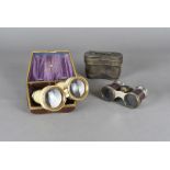 A cased pair of 19th century French ivory field and opera glasses by Charles Chevalier, in fitted