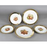 A set of Bavarian dessert plates, having fruit decoration to the centre, with gilt border,