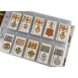 Cigarette Cards, Orders, Arms & Flags, a selection of sets held in a modern ringbinder, sets to name