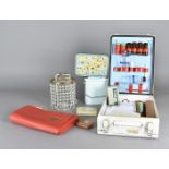 A French enamel first aid kit, another, various tins, a small glass light fitting and a Shell