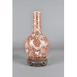 A Chinese porcelain bottle vase, the bottle shaped vase, with all over dragon design, heightened