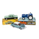 A Dinky Toys 165 Humber Hawk, black lower body, green upper body and roof, spun hubs, in original