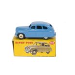 A Dinky Toys 153 Standard Vanguard Saloon, mid-blue body, cream hubs, 3rd casting, in original