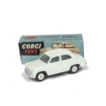 A Corgi Toys 202 Morris Cowley Saloon, very pale green body, flat spun hubs, non motorised