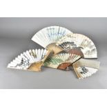 Four CAAR Chinese Advertising fans, paper and bamboo, two with printed landscapes another with