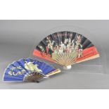 An Art Deco paper and wooden stick Advertising hand fan for La Menthe Pastille, the leaf decorated