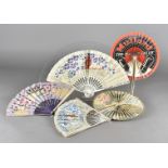 Four British Edwardian cockade paper and wood stick folding fans, related to Ekco radios, Mullard