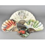 A Cherry Rocher Art Deco Advertising fan, with paper leaf and wooden sticks, the leaf decorated with