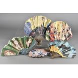 A collection of Art Deco form Ballon champagne Advertising fans, paper leaf and wood sticks,