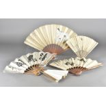 Five Korean late 19th early 20th century paper and bamboo fans, four with obverse leafs decorated