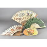 Two early 20th century Burmese paper and bamboo fans, each leaf decorated with watercolour scenes of