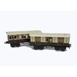 A Pair of Bing O Gauge 'Shortie' Bogie Coaches, in LNWR brown/ivory livery, comprising 1st/3rd