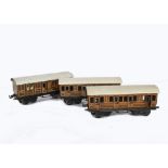 Three Bing O Gauge 'Shortie' LNER Bogie Coaches, tinprinted in 'teak' livery, two 1st/3rd composites