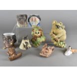 Three figural tobacco jar bases, two dog wall plaques, a koala example by Bossons and other items