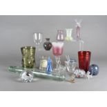 A collection of 20th Century glassware, including paperweights, Powell and Sons cranberry vases