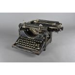 An Underwood Standard typewriter, with gilt lettering, 28 cm wide x 31 cm deep x 24 cm high