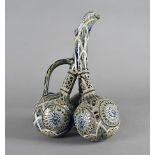An unusual Doulton Lambeth triple gourd jug, by Frank A Butler, the three gourds, with separate