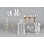 A collection of glassware, to include four champagne bowls with hollow stems, a cut glass vase,